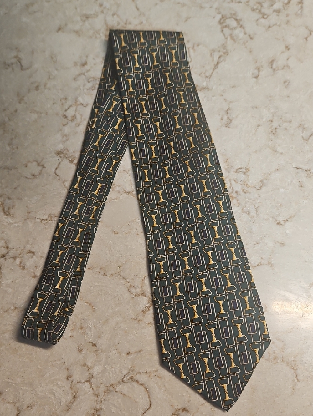 100% Silk, Made In the U.S.A. Geometric Pattern Tie in Dark Green and Gold